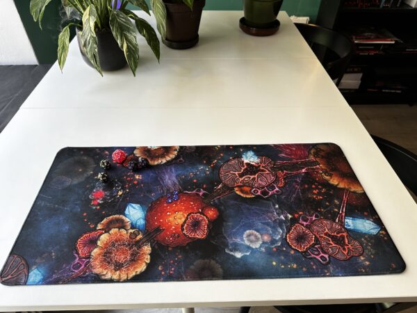 Thick stitched edge play map for TCGs or oversized mouse pad
